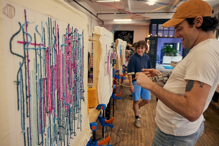 Inside the Bok Building, Tuft the World offers instructor-led intro, project-based, and group classes focused on tufting rugs.