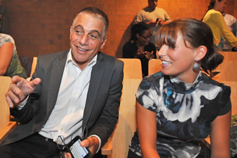 Tony Danza and Angela Galluci, an 11th-grade English teacher at Roxborough High, attend teacher orientation at Edison High School in North Philly yesterday. (Sharon Gekoski-Kimmel / Staff Photographer)