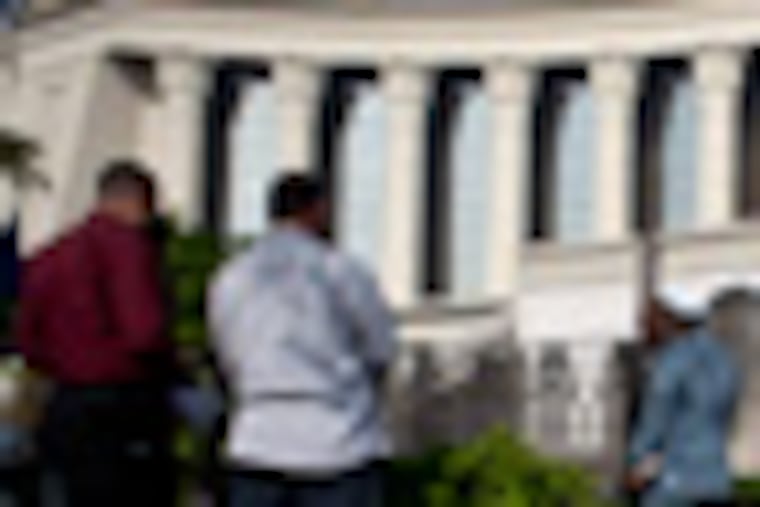 Supporters of Egyptian President Mohammed Morsi protest in front of Egypt’s top court, in Cairo, Egypt, Monday, Dec. 3, 2012. The Egyptian president's top legal adviser says the country's election commission has begun preparations for the referendum on Dec. 15 on a highly contentious draft constitution. (AP Photo/Nasser Nasser)