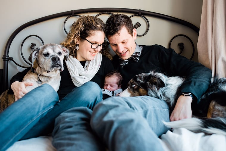 Sophie and Bryan with their baby son, River.