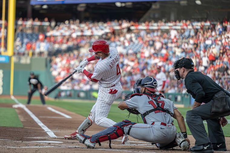 Phillies second baseman Luis Arraez, here hitting an RBI single in his first at-bat on Tuesday, seems to be settling in well.