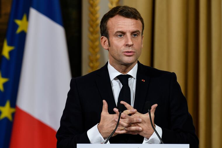 French President Emmanuel Macron gestures during a joint press conference with NATO Secretary General Jens Stoltenberg at the Elysee palace, Thursday, Nov.28, 2019 in Paris. French President Emmanuel Macron said the NATO needed "a wake up call" and that its leaders must have a strategic discussion about how the military alliance should work, including on improving ties with Russia. (Bertrand Guay, Pool via AP)