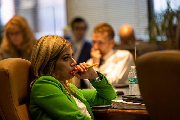Pennsylvania State Sen. Katie Muth listens during a PSERS investment committee in 2022. Lawyers for Muth and the PSERS board are expected to meet for mediation sessions this summer to try to resolve a lawsuit she filed over secret investment manager contracts, board members said.