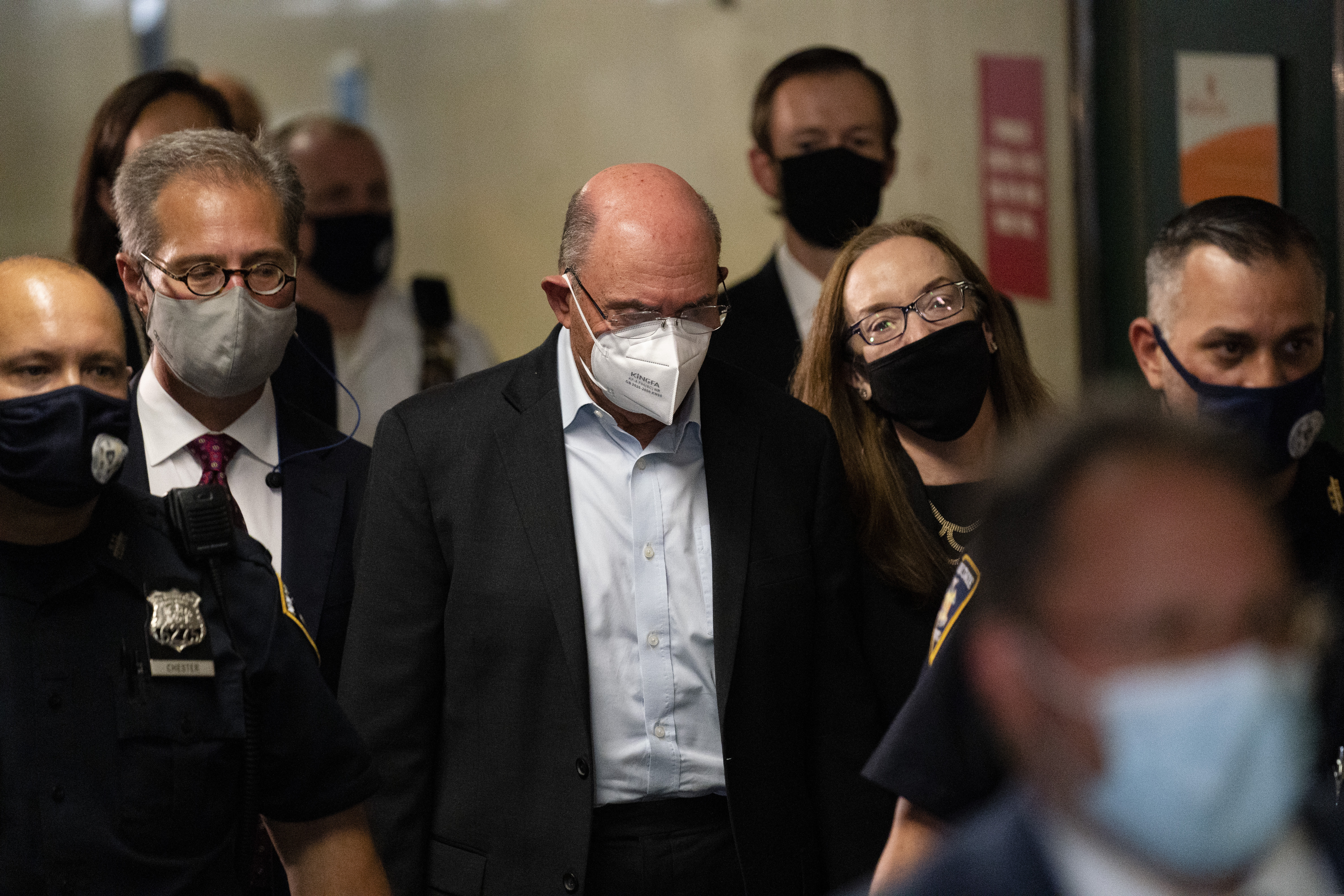 Allen Weisselberg (center), CFO of the Trump Organization, departs Manhattan criminal court on Thursday. He was arraigned a day after a grand jury returned an indictment charging him and former President Donald Trump’s company with tax crimes.