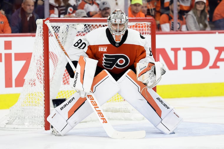 Flyers goalie Dan VladaĹ™ missed practice Thursday after he appeared to hurt his hand or arm late in Game 3 against the Penguins.
