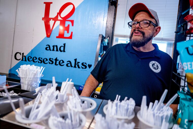 Mike Stasiunas works the takeout counter at Forksville’s Big Mike’s Steaks & Hoagies June 23, 2024, the general store he has owned since 1999. 