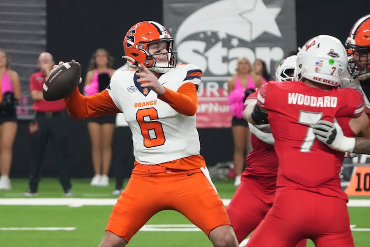 Syracuse quarterback Kyle McCord (6) looks to throw downfield against UNLV. The St. Joe's Prep grad led the NCAA in several passing categories this season.