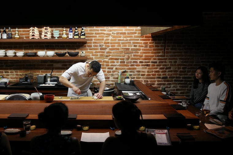 Chef and co-owner Jesse Ito prepares nigiri for the nightly omakase at Royal Sushi & Izakaya, 780 S. Second Street.