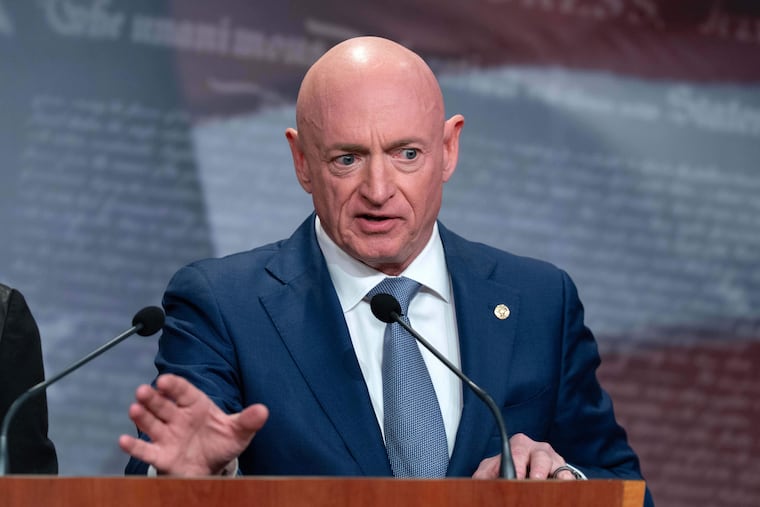 Sen. Mark Kelly speaks during a news conference at Capitol Hill on Wednesday. Kelly sued to block a censure from the Defense Secretary Hegseth.