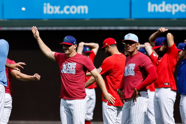 Phillies pitchers warm up during a workout at Citizens Bank Park on Tuesday.