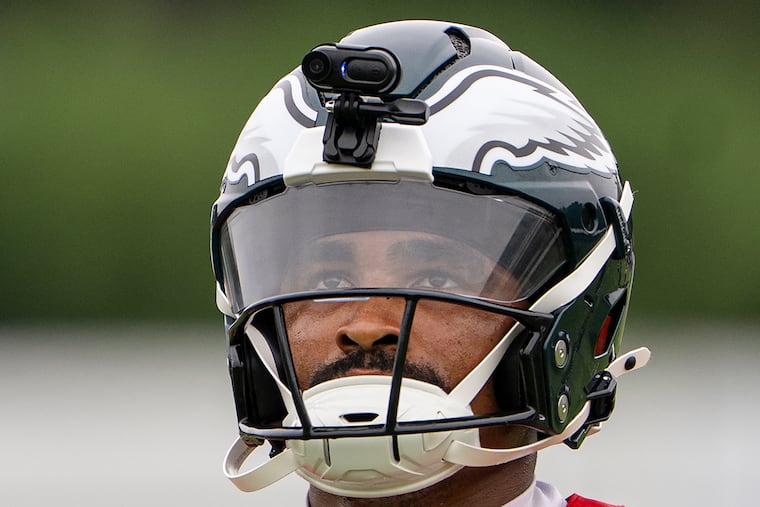 Eagles quarterback Jalen Hurts participates in training camp practice with a video camera mounted on his helmet at the Jefferson Health Training Complex.