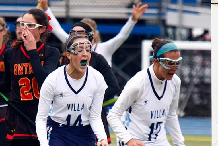 Villa Maria's Megan Vermiel (14) celebrates the Hurricanes' first goal, scored by Abby Siani (17) in the first half against Gwynedd Mercy. (Villa Maria/Staff Photographer)