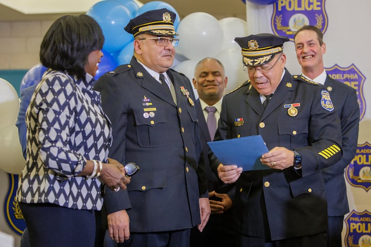 Mayor Cherelle L. Parker, left, Deputy Commissioner Pedro Rosario, center, and Commissioner Kevin Bethel at the swearing in of Rosario as the head of the police department's Kensington initiative in January 2024. Officials on Monday provided an update to the work after year one.