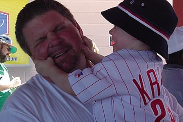 Former Phillies slugger John Kruk plays with his son Kyle, now 9, when he was 22 months old.