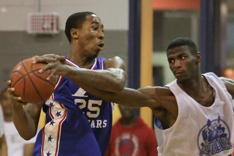 I-3's Rondae Jefferson keeps the ball from Team Philly's Rysheed Jordan during the 1st half of the Donofrio basketball game final in Conshohocken, Tuesday, April 16, 2013. I-3 beats Team Philly 123-116. ( Steven M. Falk / Staff Photographer )
