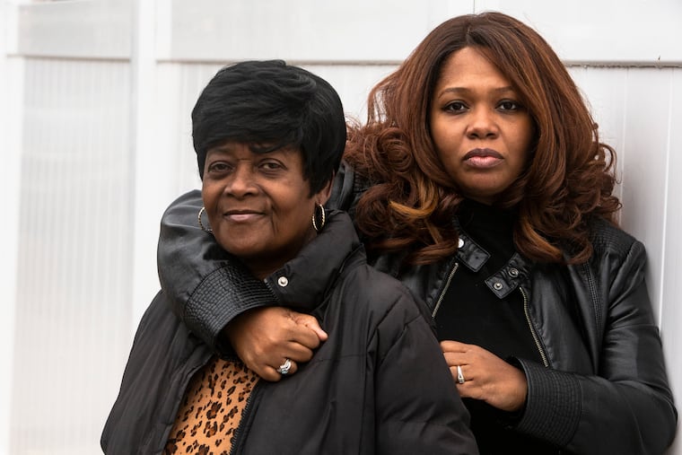 Shameka Sawyer (right) made a film about her brother, who was shot and killed in June. She with her mother, Brenda Sawyer, outside Shameka's home in West Oak Lane.