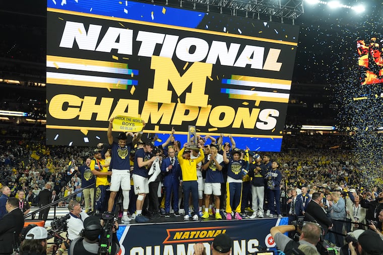Michigan celebrates after defeating UConn in the national championship game on Monday night.