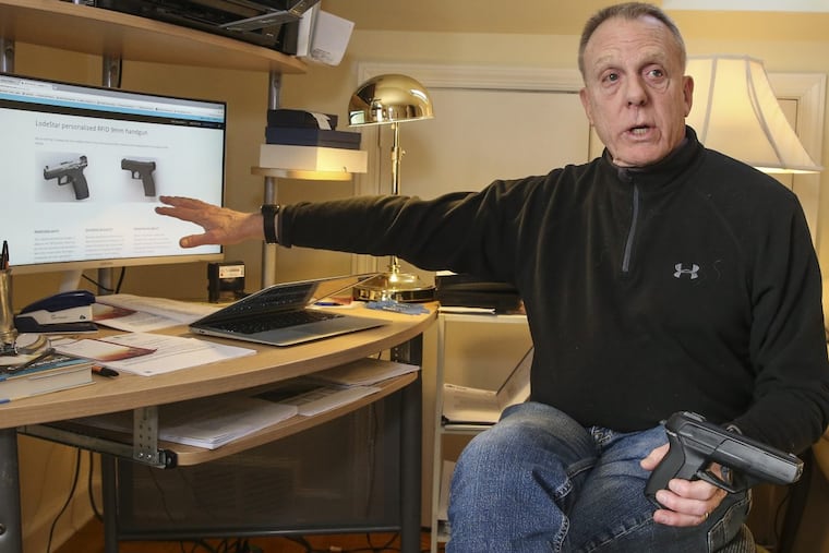 LodeStar Works, based out of Radnor, was working on a prototype 9 mm handgun with radio frequency ID — the first smart gun to be manufactured in the U.S. CEO Gareth Glaser is pictured with an early smart gun prototype. A newer prototype was on the computer monitor. Tuesday, Jan. 9, 2018.