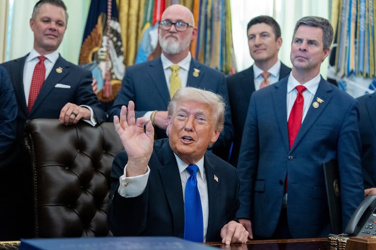 President Donald Trump speaks with reporters in the Oval Office on Thursday.