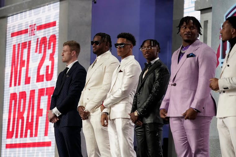 Draft prospects stand on stage before the first round of the NFL football draft, Thursday, April 27, 2023, in Kansas City, Mo.