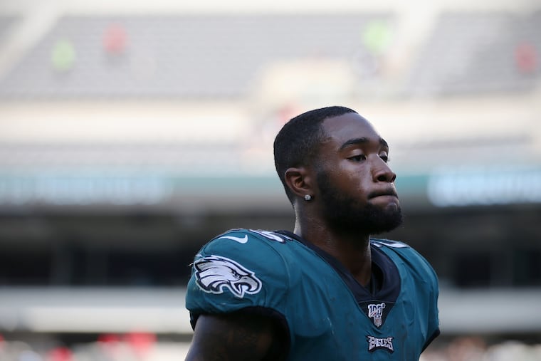 Eagles running back Miles Sanders leaves the field the team's 27-24 loss Sunday to the Detroit Lions. Sanders fumbled twice.