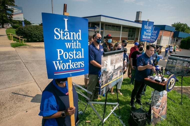 U.S. Rep. Brendan Boyle (D., Pa.) speaks in support of postal workers and the U.S Postal Service in Northeast Philadelphia on Tuesday.
