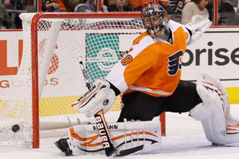 Flyers coach Peter Laviolette says his relationship with goalie Ilya Bryzgalov remains a work in progress. (Yong Kim / Staff Photographer)