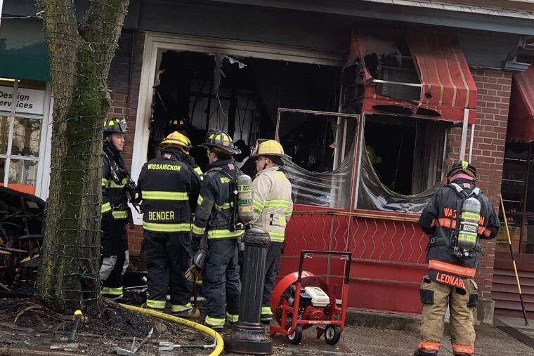 Firefighters work on the aftermath of a fire on Feb. 27, 2019, at 555 Lagiola restaurant in Ambler.