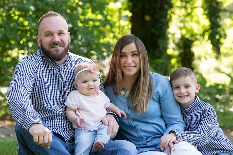 Mike and Candice with baby Quinn and 6-year-old Chance.