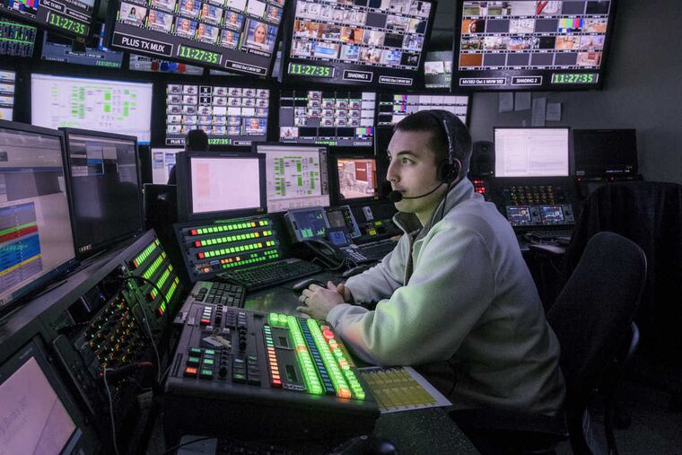 Master Control Operator Ben Yocum monitors programing and data in the control room.