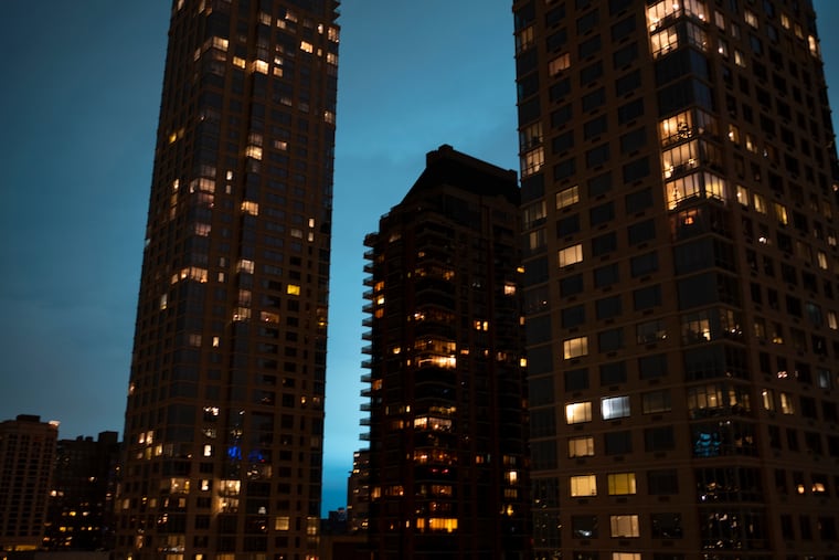 Viewed from the Upper West Side of Manhattan, the night sky is alight during a transformer explosion at a Con Edison facility in the Queens borough of New York on Thursday.