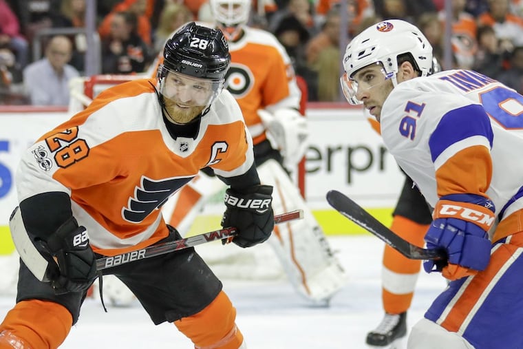 Philadelphia Flyers center Claude Giroux and New York Islanders center John Tavares are among the National Hockey League’s points leaders this season.