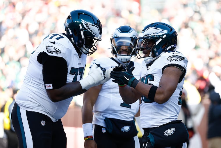 Saquon Barkley and Jalen Hurts gave Mekhi Becton (left) and the rest of the Eagles offensive line custom four-seater golf carts with each player's last name and number on it.