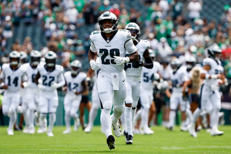 Eagles running back AJ Dillon takes the field during a preseason game against the Cleveland Browns in August.
