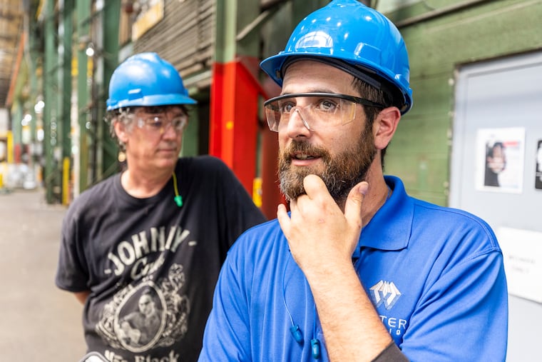 Joe Raspa of Cherry Hill and Jeff Garrison of Pennsauken work at Western Extrusions, a company trying to revive manufacturing at its plant in South Jersey.