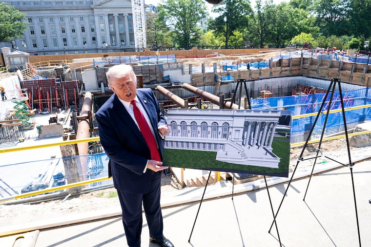 President Donald Trump speaks to reporters at the construction site of the new White House ballroom in Washington, May 19, 2026. Documents reviewed by the Washington Post show that the project will cost about $600 million, with more than half funded by taxpayers.