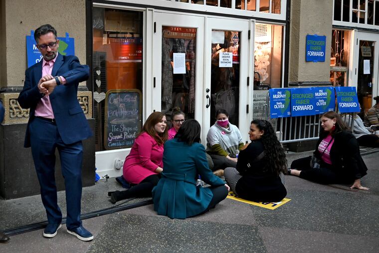 Supporters of Gov. Phil Murphy wait late into the evening as their candidate is locked in a tight battle with Republican Jack Ciattarelli,
