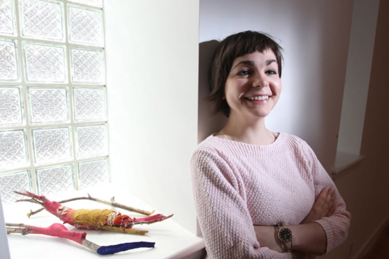 Joanna Sarver, who waits tables at Alla Spina restaurant, is also an artist and graduate of the Tyler School of Art. She created this “Ritual Objects” piece that is being shown in an exhibit at Metropolitan Gallery 250, off Rittenhouse Square. (Michael Bryant / Staff Photographer)