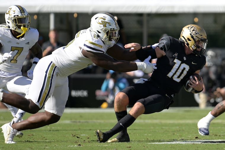 Georgia Tech defensive lineman Keion White sacks Central Florida quarterback John Rhys Plumlee during a game in September.