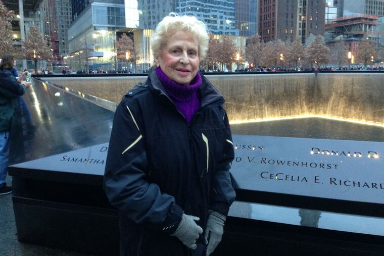 Sally Gimbel Taussig visiting the 9/11 World Trade Center memorial in New York City.