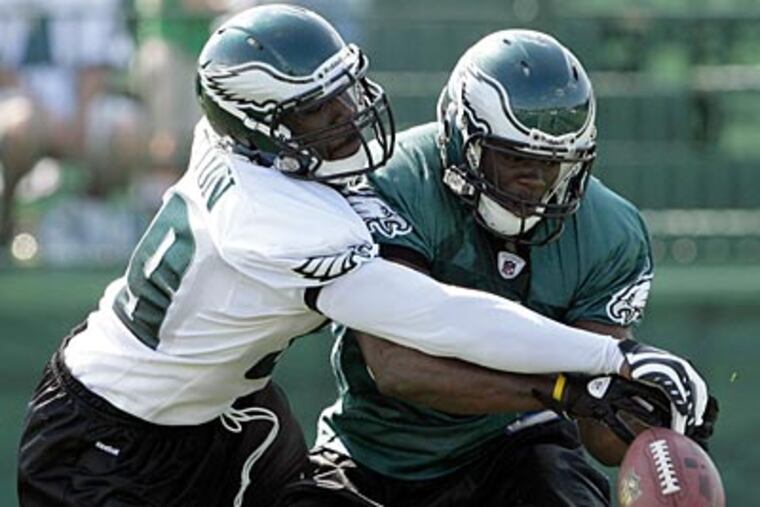 Fourth-round rookie linebacker Keenan Clayton (left) had an interception against the Bengals Friday. (Yong Kim / Staff Photographer)