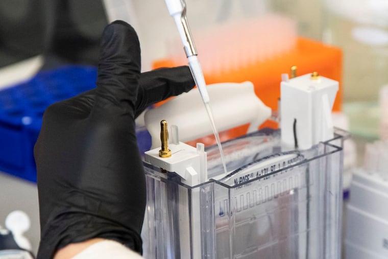 Daniel Park, Penn graduate student, does a western blot analysis to compare different versions of the coronavirus vaccine at the Wistar Institute in Philadelphia on Feb. 7, 2020.
