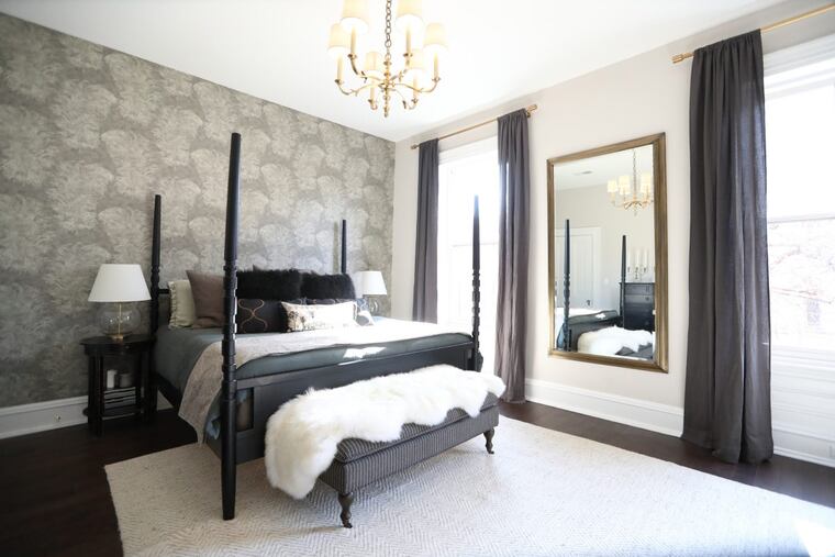 The trick to block out light in your bedroom so day seems like night: layered window treatments.