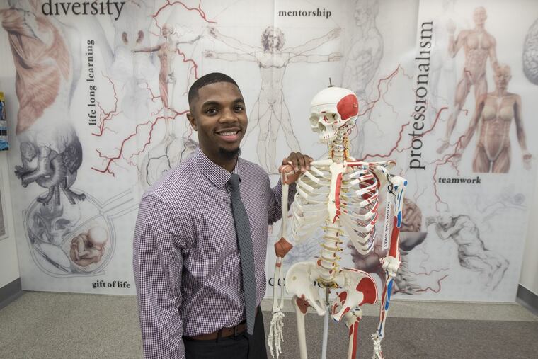 Jamil Miller, 23, recent grad of Rowan University, in the gross anatomy lab at Cooper Medical School of Rowan University June 5, 2017. Miller, who grew up in tough circumstances in Camden, is participating in the med school’s PULSE program — Pre-medical Urban Leaders Summer Enrichment — for young people interested in medical careers.