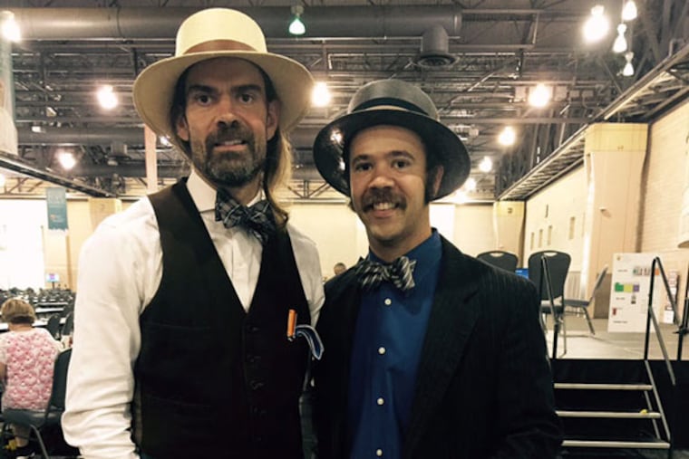Brothers Ryan (left) and Eric Berley are proud to have created a caramelized banana ice cream especially for Pope Francis’ visit. (STEPHANIE FARR/DAILY NEWS STAFF)