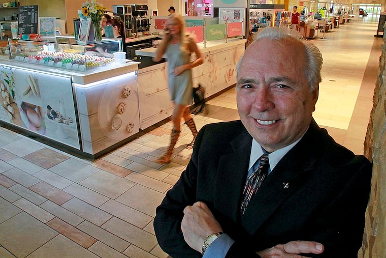 Joe Purifico, president and general counsel at JBC & Associates, which helps small retailers grow, stands near the Woops pop-up store at Christiana Mall in Delaware.