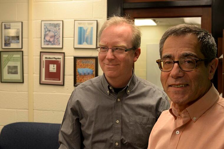 Penn physicists Charles L. Kane (left) and Eugene J. Mele. Their work predicted a class of materials called topological insulators that could have widespread technological applications. (TOM GRALISH / Staff Photographer)