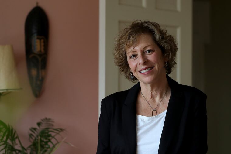 Ilene Raymond Rush poses in her home in Elkins Park, Pa. on November 13, 2018.