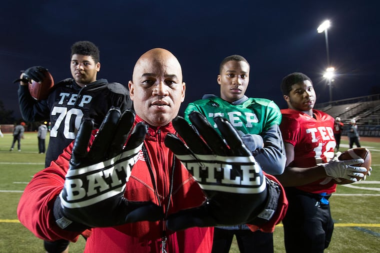 Imhotep's Yasir Durante, head coach Albie Crosby, Nasir Boykin and Amin Black.