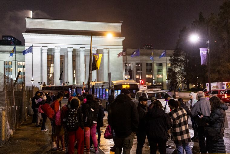 Families seeking asylum in Philadelphia arrive early morning from Texas at the 30th Street Station in Philadelphia, Pa., on Friday, Nov. 25, 2022.